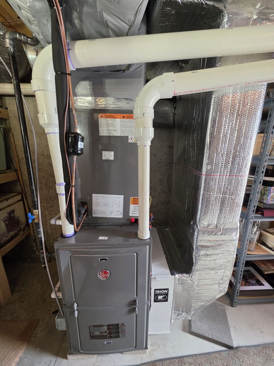 Natural gas forced air furnace retrofitted to existing ductwork