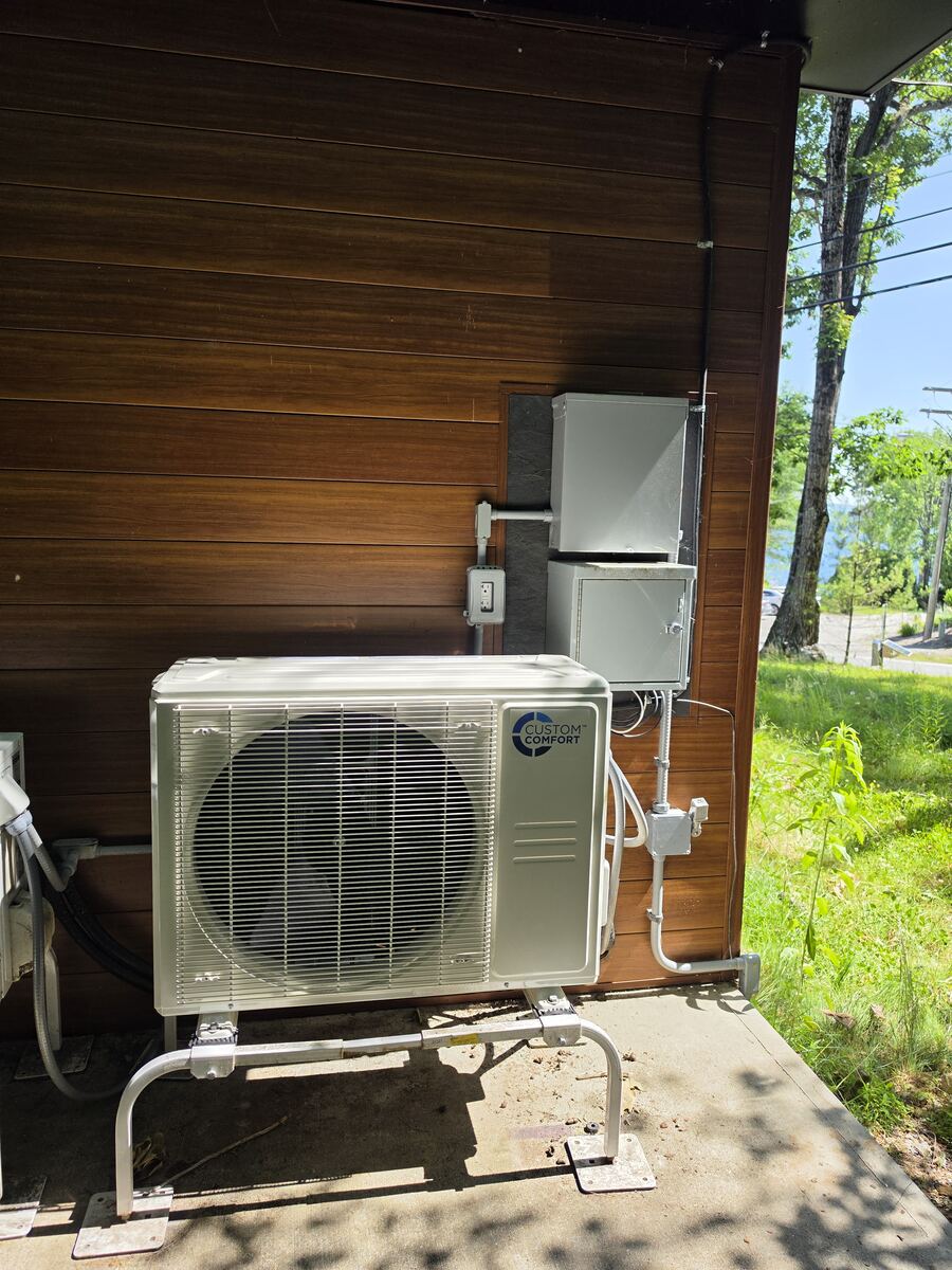 Ductless mini-split outdoor unit installed at the Kelby Motel on Newfound Lake