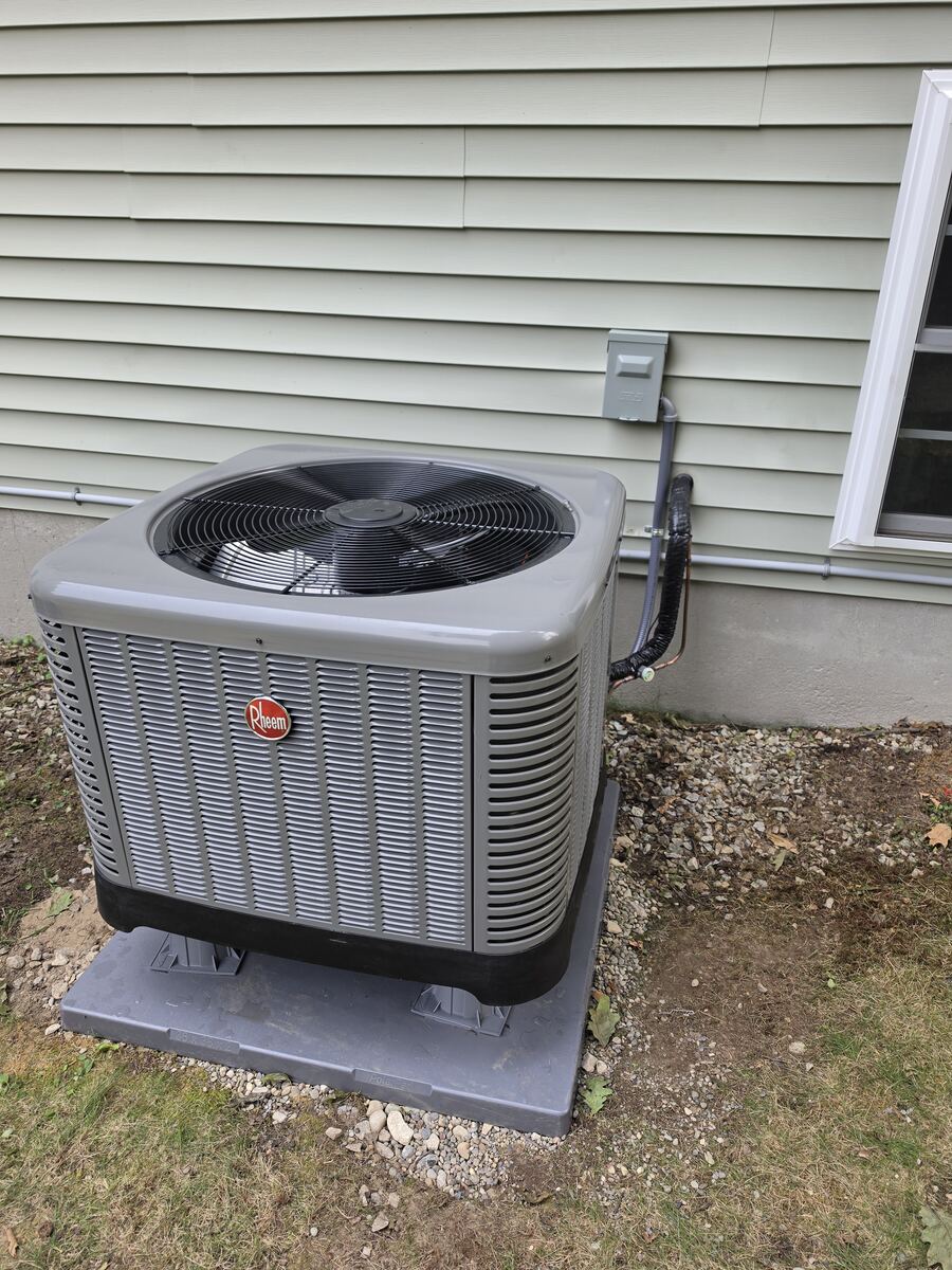 New outdoor AC condenser installed for an oil-fired forced air zoning project